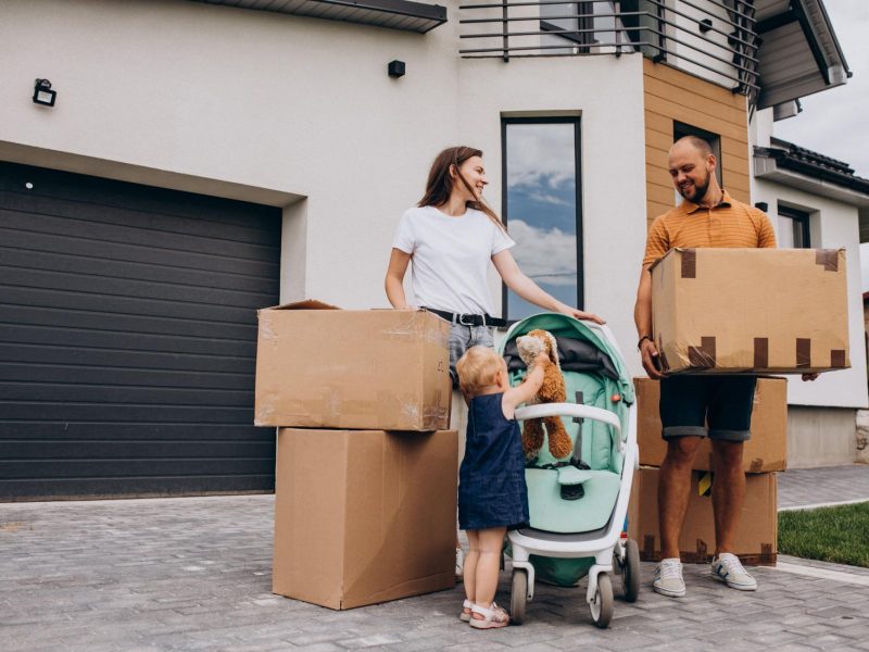 young-family-with-little-daughter-moving-into-new-house (1)
